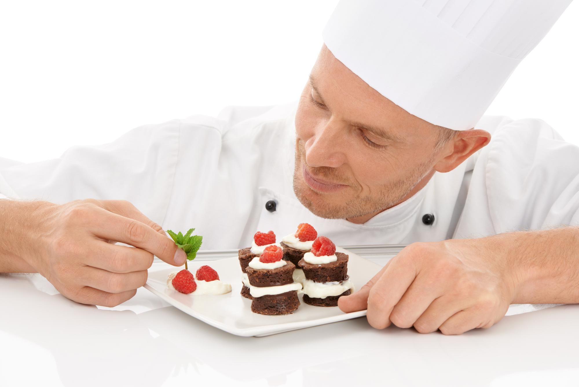 Students plating desserts in studio